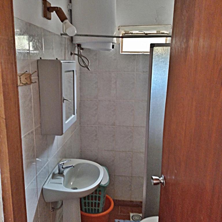Es aca - Two-Bedroom House - 12