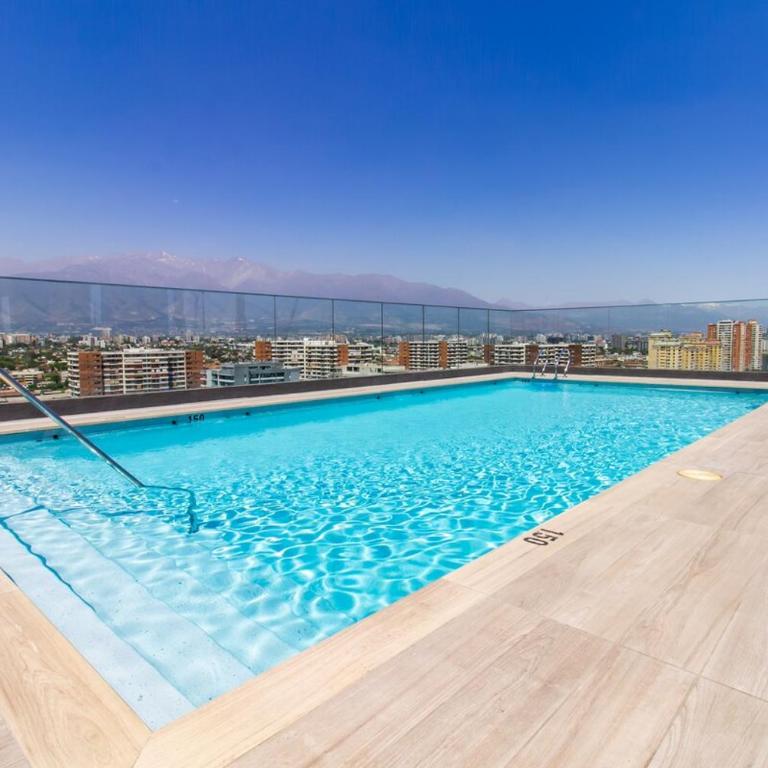 Confort y Estilo cerca e Metro Irarrázaval - Two-Bedroom Apartment - 49