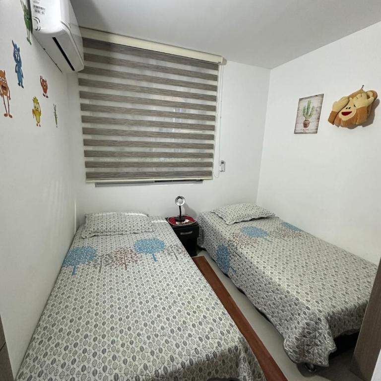 Apartamento en Ricaurte, ideal para descanso familiar - Three-Bedroom Apartment - 12