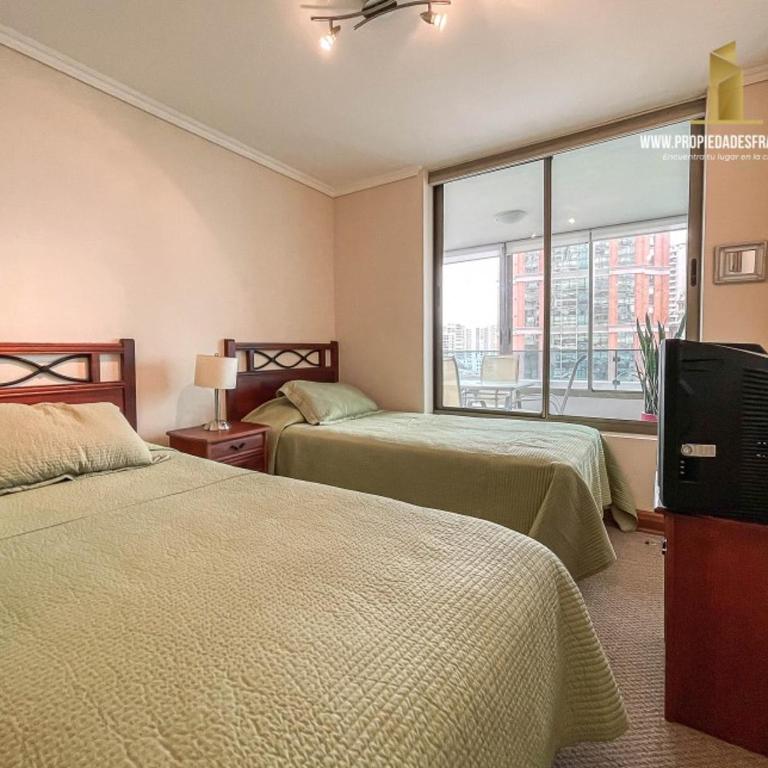 Departamento con Terraza, Vista al Mar y Piscina en Viña - Three-Bedroom Apartment - 23