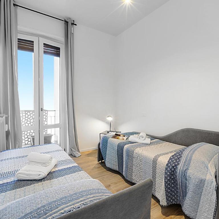 Specchio Di Cielo: Apartment with Terrace and AC Arona Center - Happy Rentals - Appartamento con Terrazza - 8