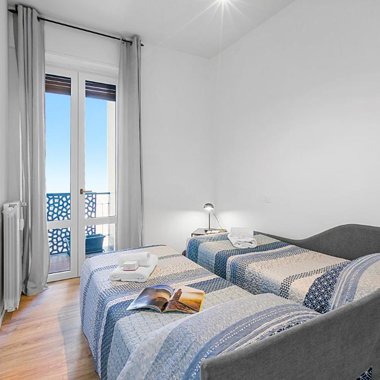 Specchio Di Cielo: Apartment with Terrace and AC Arona Center - Happy Rentals - Appartamento con Terrazza - 23