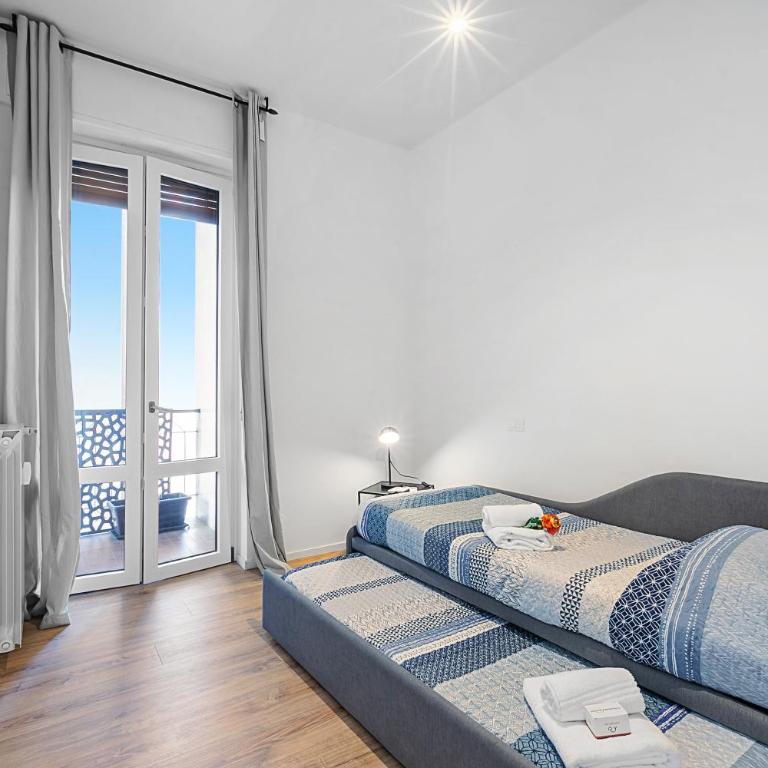 Specchio Di Cielo: Apartment with Terrace and AC Arona Center - Happy Rentals - Appartamento con Terrazza - 27