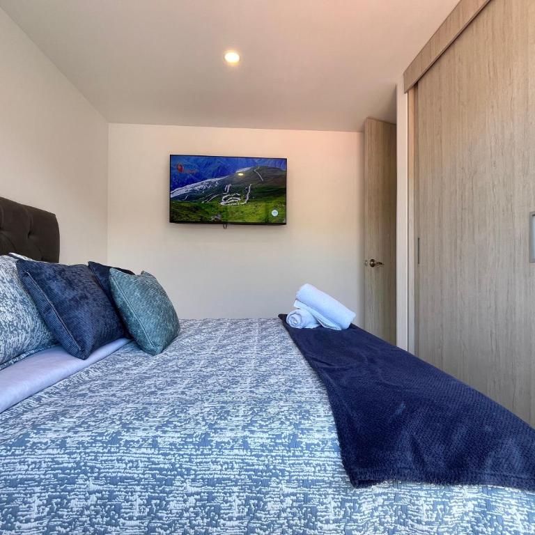 Nuevo, cómodo y con parqueadero - Apartamento de 2 dormitorios - 16