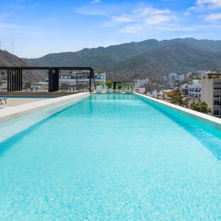 2BR Luxury Condo with Rooftop Pool Zona Romántica - Apartamento de 2 dormitorios con vistas parciales al océano - 33