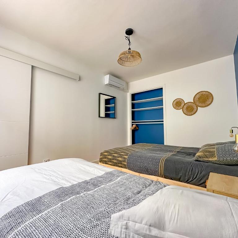 L'aube Climatisation Parking 2 chambres - Two-Bedroom Apartment - 24