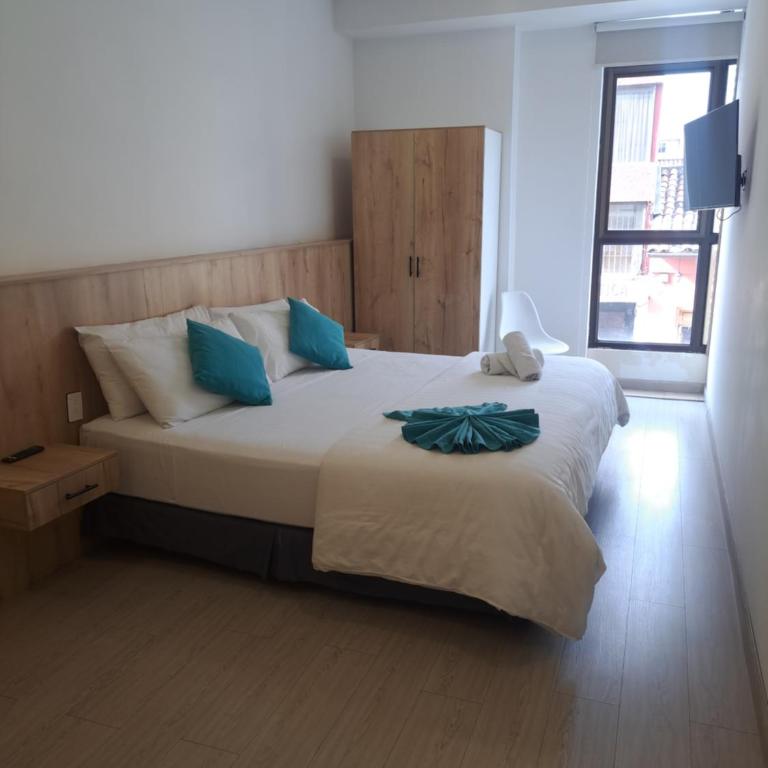 Apart Hotel Casa Blanca - Habitación con cama extragrande. - 25