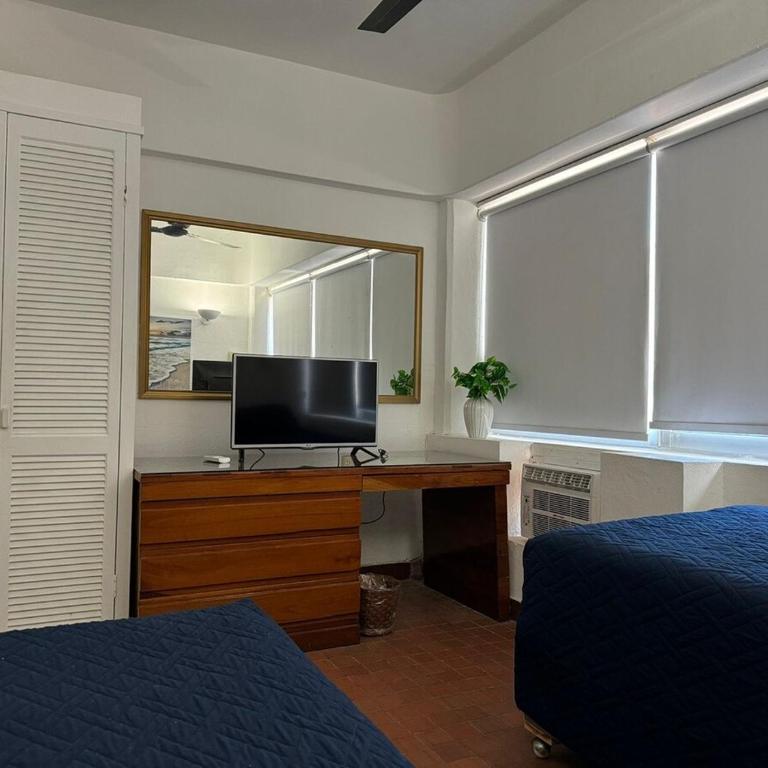 Beachfront apartment with a pool Islas del Sol - Three-Bedroom Apartment - 19