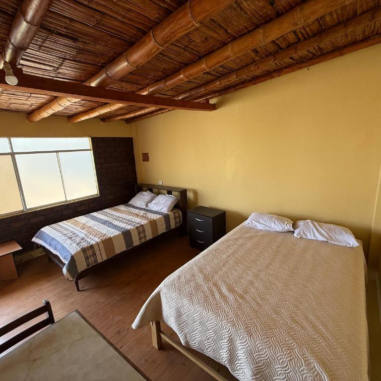 Alojamiento privado en casa de playa - Deluxe Queen Room with Two Queen Beds - 2