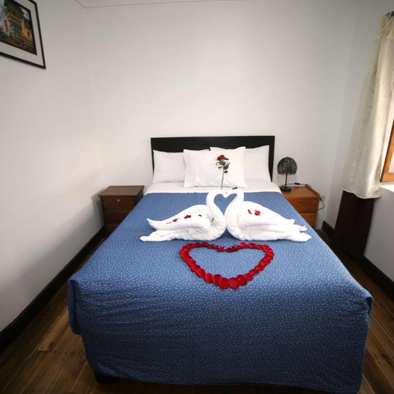 Cusco el Conquistador - Habitación con cama extragrande y vistas al jardín - 5