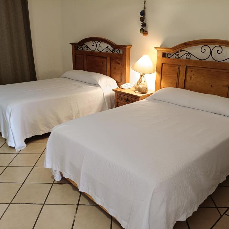 Hotel Hacienda Bugambilias La Paz - Habitación Doble Estándar con 2 camas dobles - 4