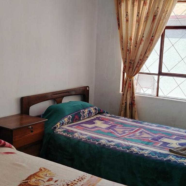 Casita Vacacional - Three-Bedroom House - 4