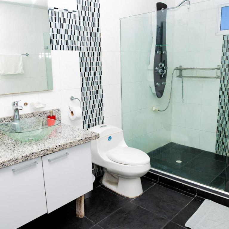 Departamento Bocagrande cerca a playas - Four-Bedroom House - 9