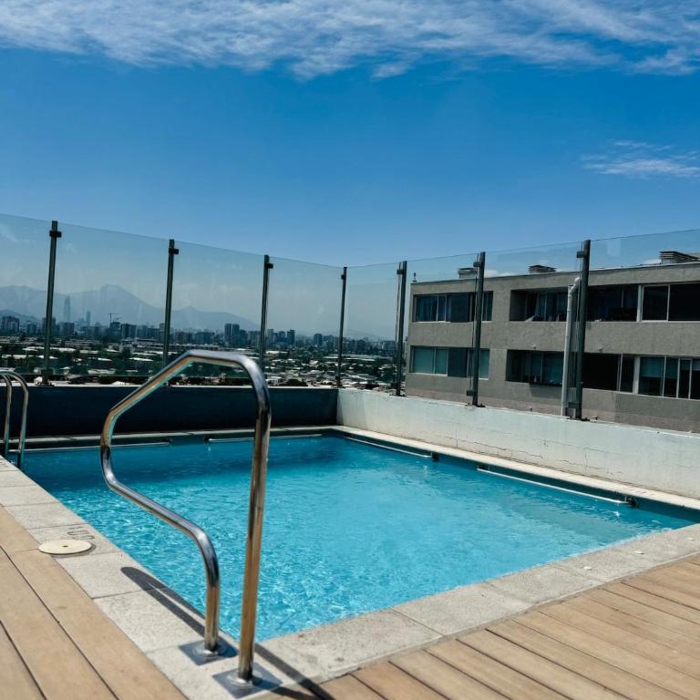 Departamento con Piscina y Parking, a Pasos del Estadio Nacional, Metro y Campus Universitario San Joaquín - One-Bedroom Apartment - 10