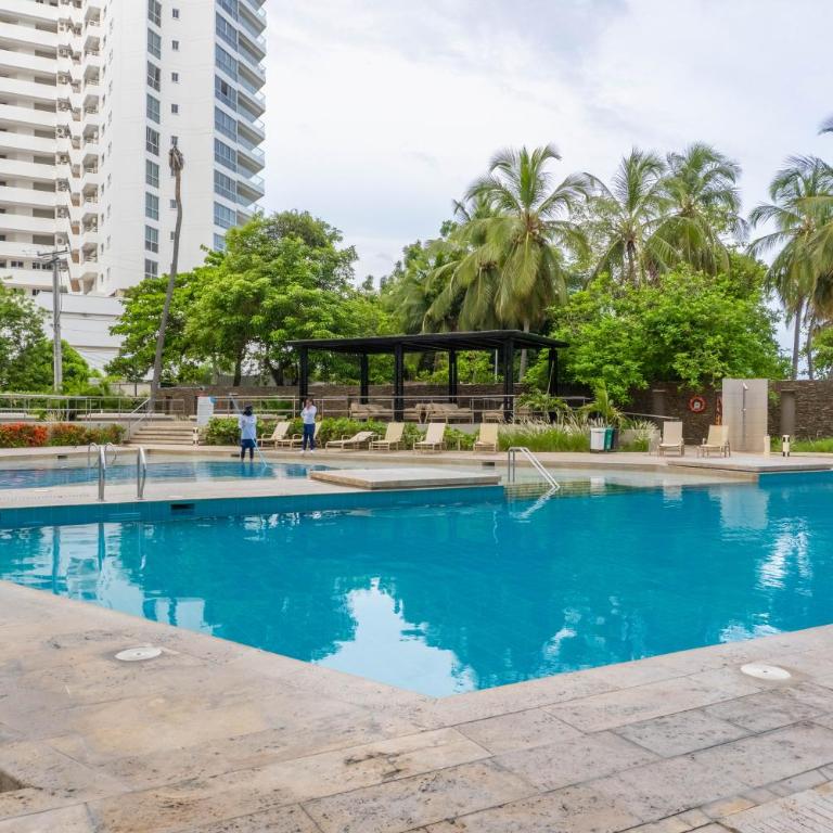 Apto con Vista al Mar, Piscinas, jacuzzis y club de playa en Reserva del Mar - Apartment - 25