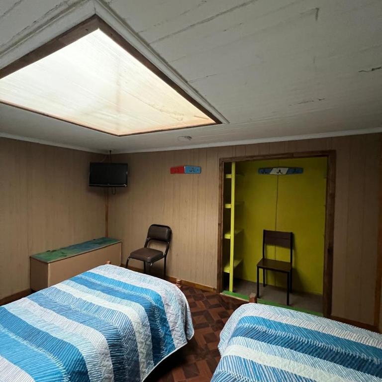 Hostal y Residencial El Mundial - Habitación Doble - 2 camas - 1