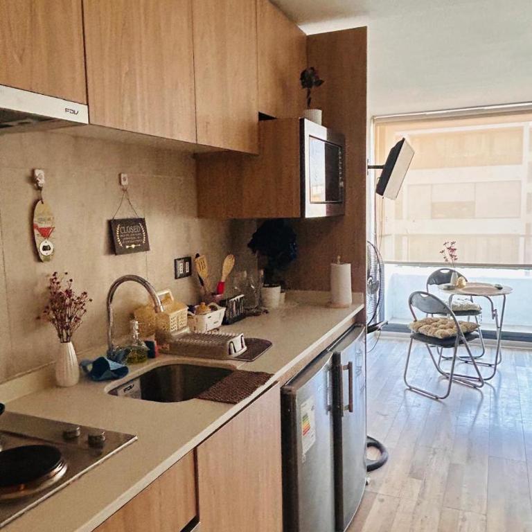 Dpto cercano al Movistar Arena 2 - One-Bedroom Apartment with Balcony and City View - 8
