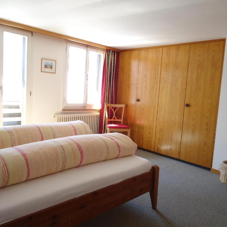 Hotel Tschuggen - Doppelzimmer mit Balkon und Blick auf den Eiger - 12