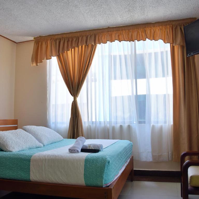 Hostal Dulce Amanecer - Habitación Cuádruple con balcón - 12
