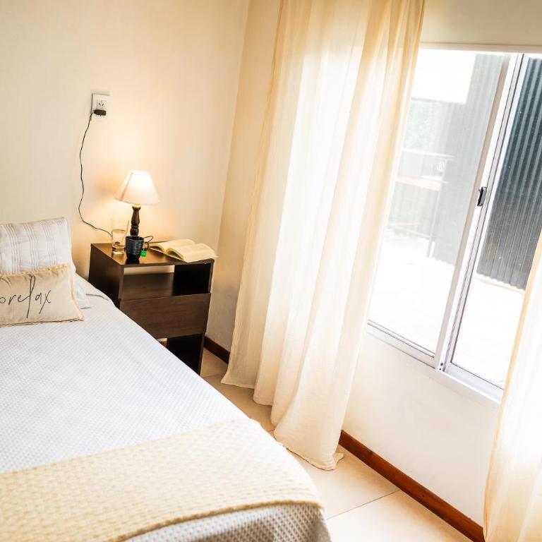 Casa tipo Estudio de concepto abierto, Centrica, Parrilla, Cochera Privada y Portón Eléctrico - Apartamento de 1 dormitorio - 6