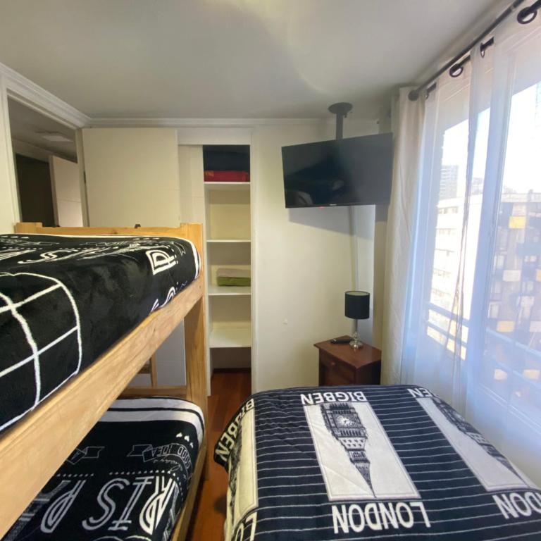 centro santiago - Three-Bedroom Deluxe Apartment - 12
