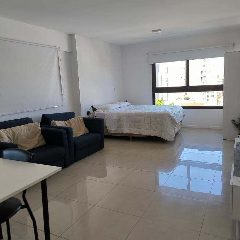 Depto con cochera, luminoso y vista abierta - Apartamento de 1 dormitorio - 33