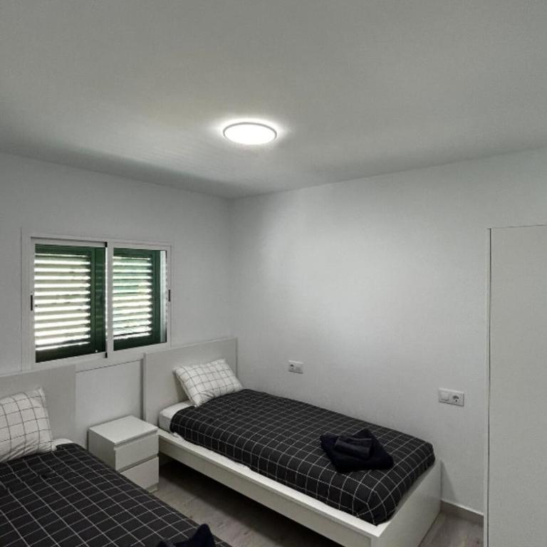 Beach life only 5 minutes away and Heated pool - Two-Bedroom Apartment - 13