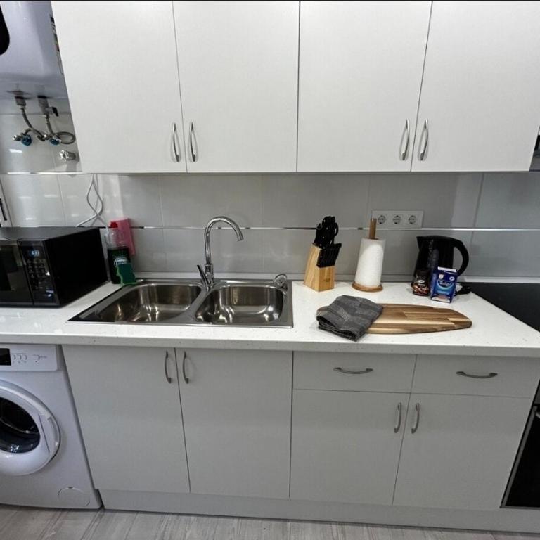 Beach life only 5 minutes away and Heated pool - Two-Bedroom Apartment - 17