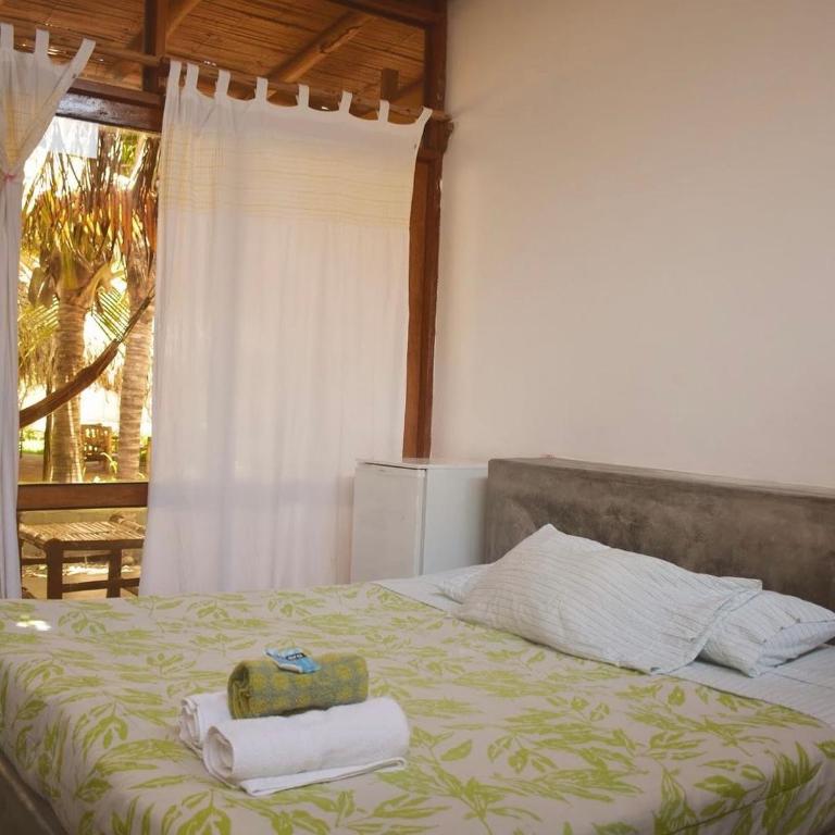 La Casa de Sebas Bali Logde - Habitación con cama grande y vistas al jardín - 3