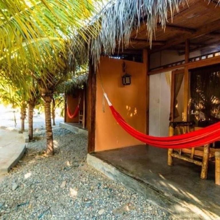 La Casa de Sebas Bali Logde - Habitación con cama grande y vistas al jardín - 2