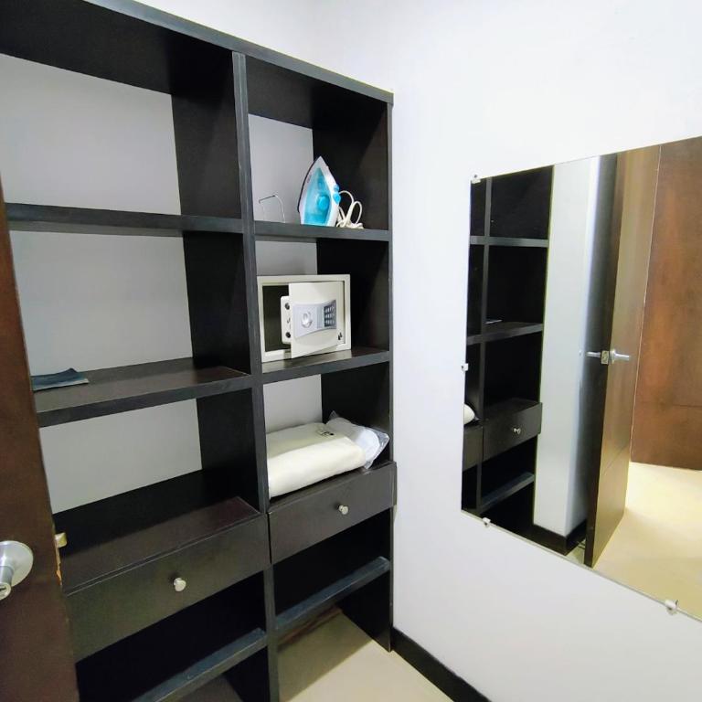 Apartamentos Amoblados-Atlantis Suites Bquilla - Habitación Deluxe con cama extragrande - 15