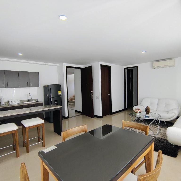 Apartamentos Amoblados-Atlantis Suites Bquilla - Habitación Deluxe con cama extragrande - 21