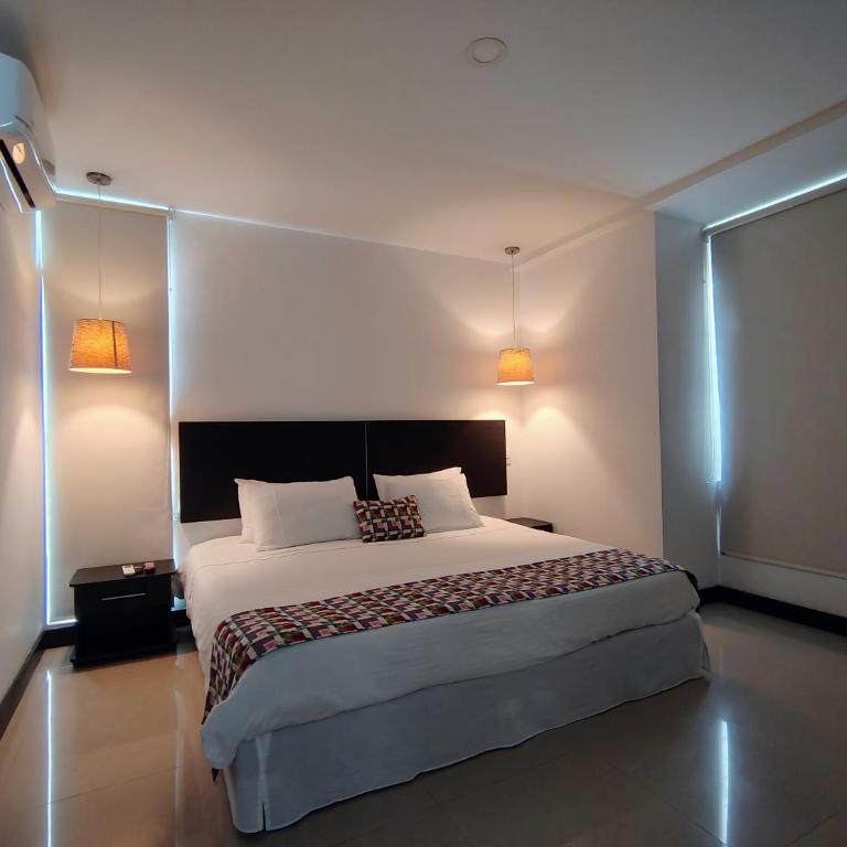 Apartamentos Amoblados-Atlantis Suites Bquilla - Habitación Deluxe con cama extragrande - 19