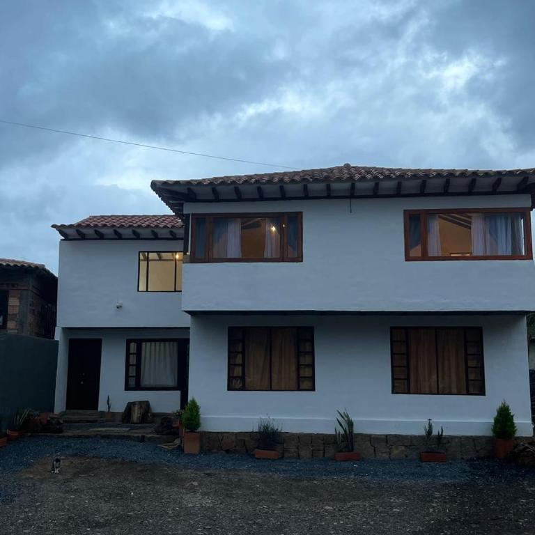 La Estancia Colonial - Three-Bedroom House - 16