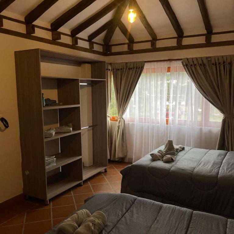 La Estancia Colonial - Three-Bedroom House - 22