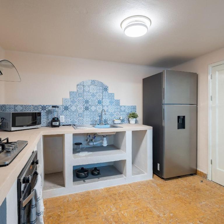 Casa céntrica con 4 habitaciones y estacionamiento - Casa de 4 dormitorios - 62