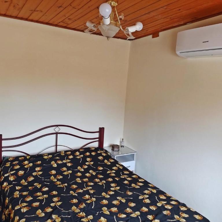 Hospedaje ES ACA - Two-Bedroom House - 8
