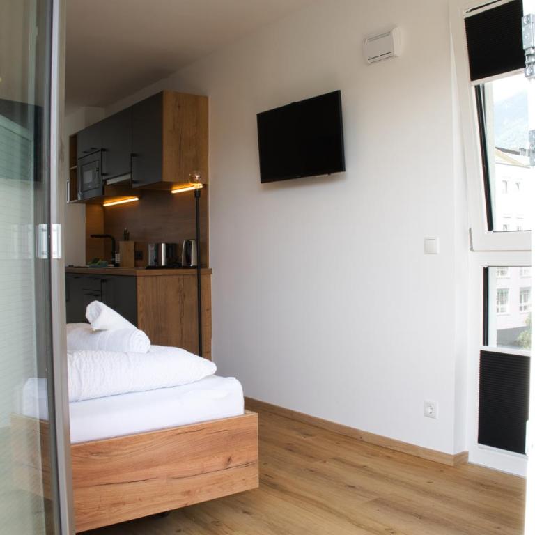 myQuartier City Chalets digital self check in - Studio S mit Balkon - 2