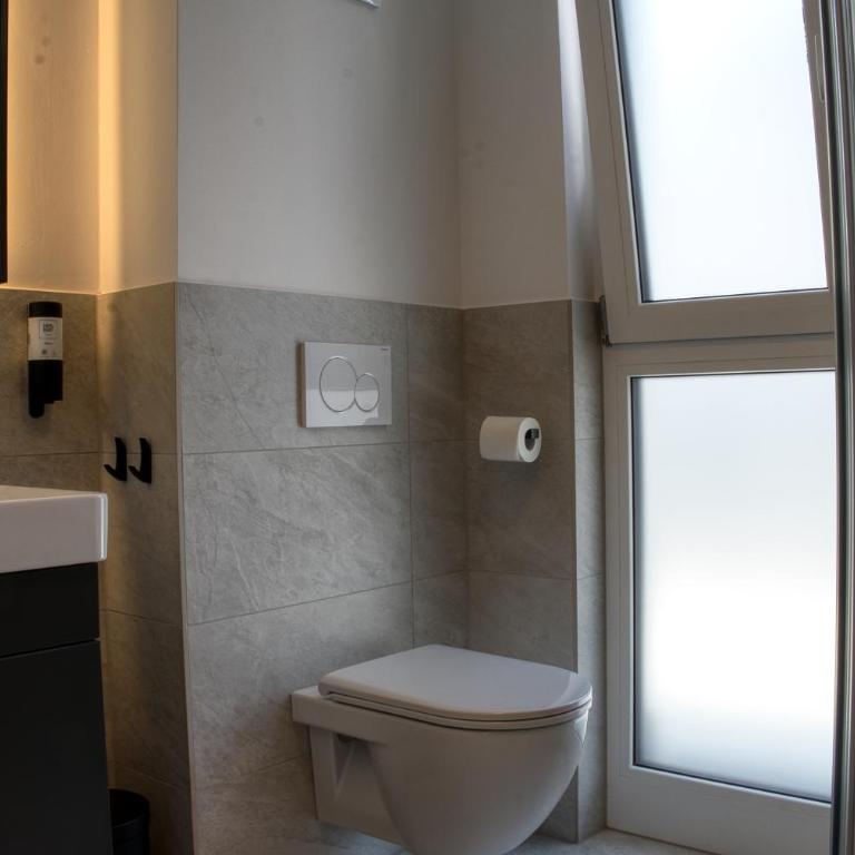 myQuartier City Chalets digital self check in - Studio S mit Balkon - 1