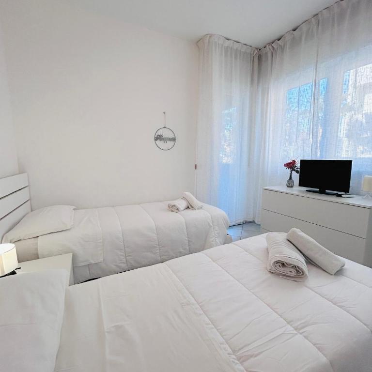Appartamenti Carinzia Fronte Mare - Flexrent Immobiliare Abissinia - Appartamento con 2 Camere da Letto e Vista Mare - 20
