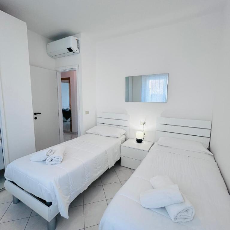 Appartamenti Carinzia Fronte Mare - Flexrent Immobiliare Abissinia - Appartamento con 2 Camere da Letto e Vista Mare - 23