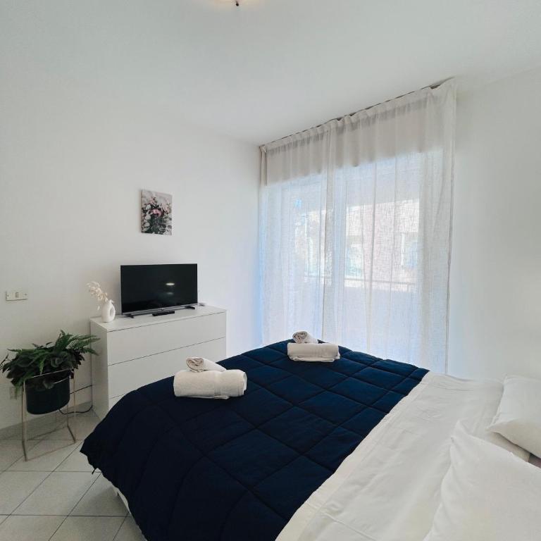 Appartamenti Carinzia Fronte Mare - Flexrent Immobiliare Abissinia - Appartamento con 2 Camere da Letto e Vista Mare - 17