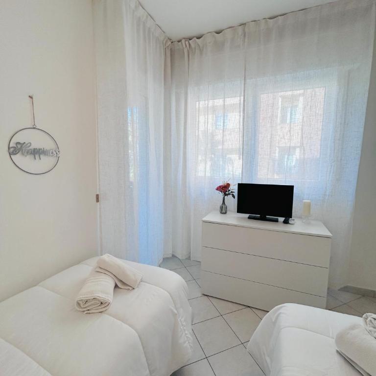 Appartamenti Carinzia Fronte Mare - Flexrent Immobiliare Abissinia - Appartamento con 2 Camere da Letto e Vista Mare - 24