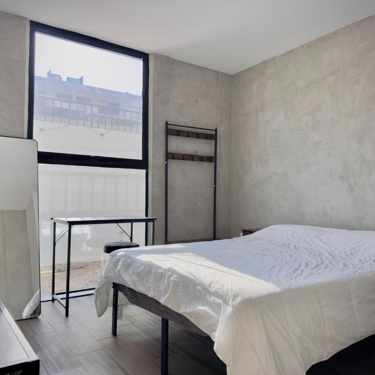 Departamento Completo con Terraza, Alberca y Gimnasio - Apartamento de 2 dormitorios - 34