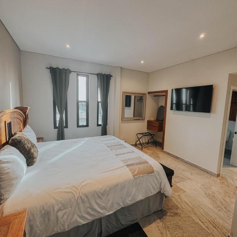Suites Lassa - Suite Superior con cama extragrande - 14