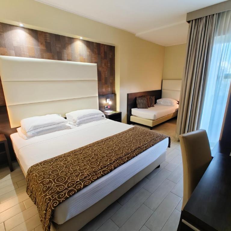 Hotel Pineta Palace - Premium Triple Room - 1