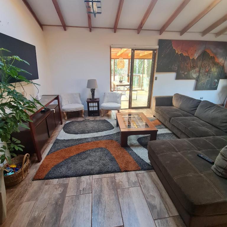 CASA CON TINAJA, PISCINA Y QUINCHO - Pucón - Three-Bedroom Vacation Home - 31