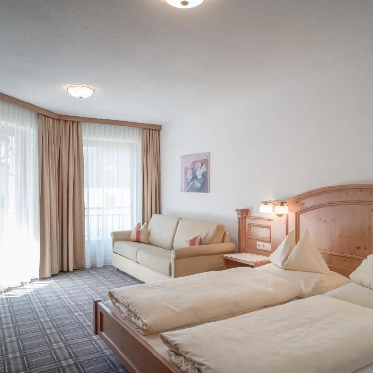 Hotel Garni Alpenresidenz Zimmer & Aparts - Deluxe Apartment mit 2 Schlafzimmern - 1