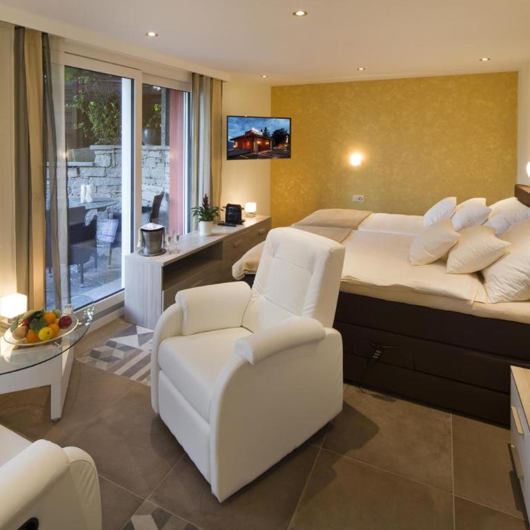 Boutique Hotel Albergo Brione - Camera Matrimoniale Deluxe con Vista Giardino - 4