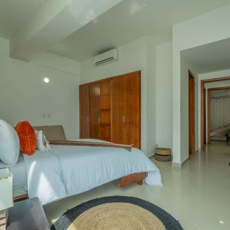 Un espacio sofisticado en medio de El Laguito Edificio Poseidon del Caribe - Apartamento de 2 dormitorios con balcón y vistas al mar - 10